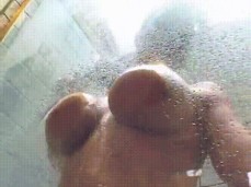 Lisa Ann boobs pushed against glass gif