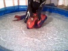 spiderman deafeated by his slippery wet orca enemy gif