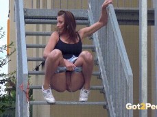 Pissing on stairs outside motel gif