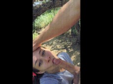 girl deep throats cock outside during the day gif