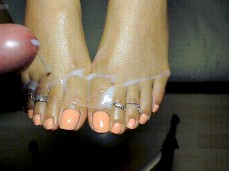 cumshot on feet with toe rings gif