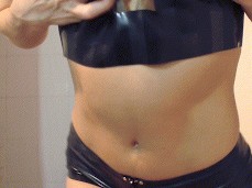 Sexy Brunette in Latex Underwear Striptease gif