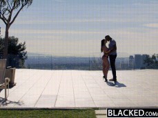Angela White in bikini making out with  stud on patio gif