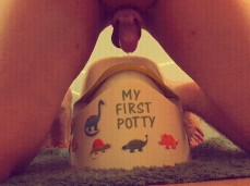 Chastity orgasm into potty chair gif