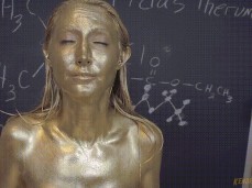 Oooops chemist accidently turns herself into a golden statue gif