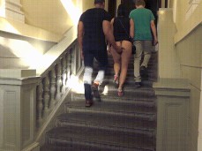 stud slapping a white wife's ass as couple takes him upstairs gif