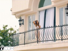 Eva Lovia in panties on balcony gif