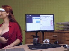 Amateur redhead shows off cleavage and invites touching in office gif