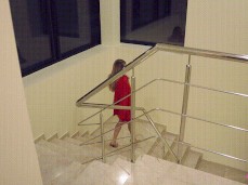 Luxury Girl walking down the stairs in lingerie gif