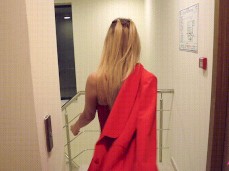 Luxury girl exits hotel room in lingerie gif