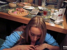 Luxury girl sucking dick under table at diner gif