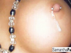 Samantha Saint spits on her pierced nipples gif