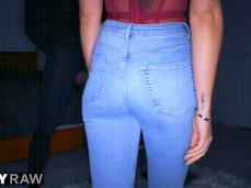 Little Caprice booty in jeans walks towards bare cock gif