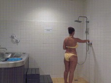 Jennifer Amton rinses in shower before betting in hot tub gif