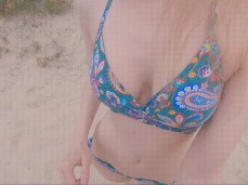 Anika Spring leading by the hand through the sand dunes gif