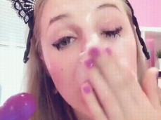 Little blonde cumslut covers her face in her own spit gif
