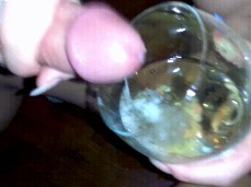 cumming in glass filled with piss gif