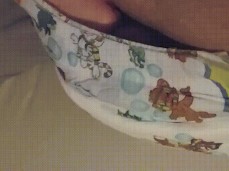 diaper twink plays with himself on bed gif