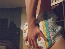 cute twink shows off poofy diaper butt gif