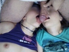 two girls gently lick a dick gif