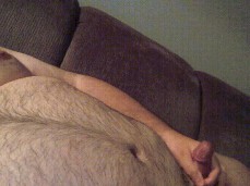 Front couch wank to some straight porn gif