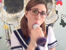 Cute nerdy girl teases you with dildo bj gif