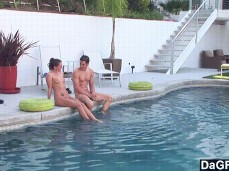 Tori  and guy friend hang out on edge of pool naked gif