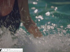Thong swimsuit fooling around in pool gif