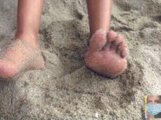 Viva Athena Gets Sandy Feet on the Beach gif