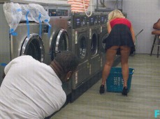 Katie Morgan watched while she puts her panties in the laundromat's machine gif
