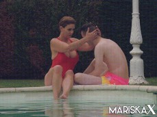 Sandy Lou presses his face into her tits poolside gif