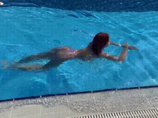 Sweetie Fox swimming in thong bikini 03 gif