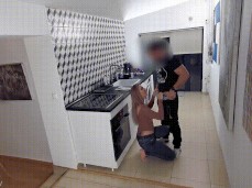 Wet Kelly gives  blowjob in kitchen 01 gif