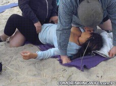 Cum Drinking Wife with two men at the beach gif