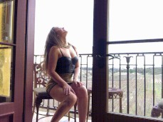 Dani Daniels on balcony shows off she's not wearing panties 03 gif