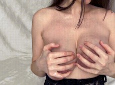 woman presenting her swollen big tits gif