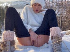 Emma Hix masturbating her wet pussy outside in the snow gif