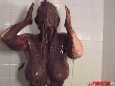 Busty milf gets totally covered in brown sludge gif