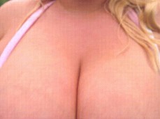 sweet chubby blonde Annabelle Rogers teases with her huge tits gif