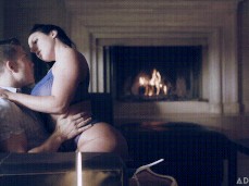 Angela White in sheer lingerie climbs on his lap gif