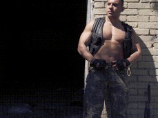 Handsome, bare-chested, military muscle hunk jacks off outdoors 0421 gif