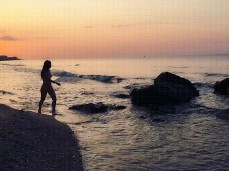 naked walk at sundown on the beach gif