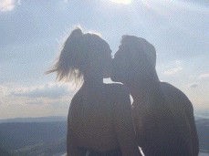 Passionate making out on a hill gif