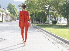 Naughty Lada walking in transparent red bodysuit gif