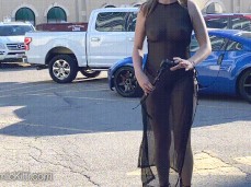 Cosmickitti in sheer outfit dancing in parking lot gif