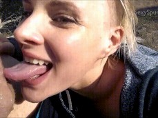 Hot babe licking balls with long tongue outdoors and saying its yummy LOL gif