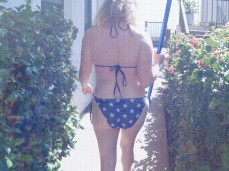 Erin Electra walking in flag bikini gif