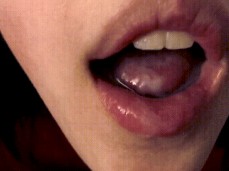 Slut plays with cum in mouth gif