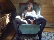 Natasha Heller in lace and stockings rubs her cunt in a cabin gif