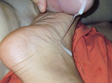 Cumshot over her foot - no touch gif